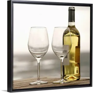 "bottle of white wine and two glasses" Black Float Frame Canvas Art - Multi